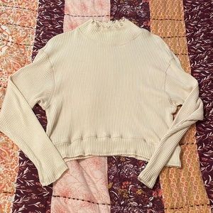 woman’s mock neck crop top